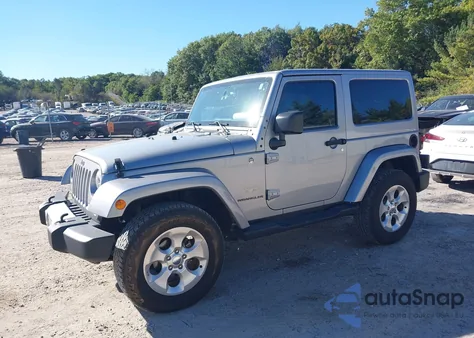 2015 Jeep Wrangler Sahara z USA, uszkodzony, nr VIN 1C4AJWBG2FL682417